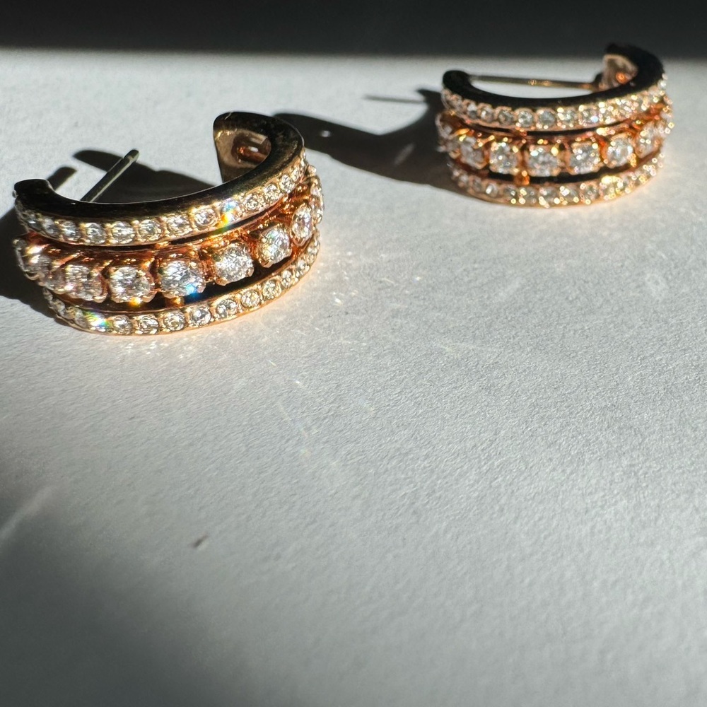 SWAROVSKI huggie hoop style crystal earrings for pierced ears